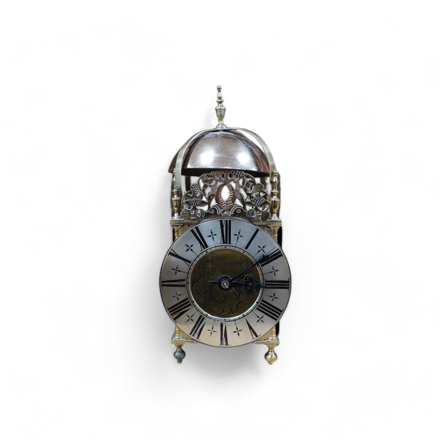 Manner of Richard Rayment of Bury. A Victorian 17th century style lantern clock, in traditional brass case with silvered Roman dial and eight day single fusee movement striking on a bell, 17cm wide, 14.5cm deep, 38cm hig